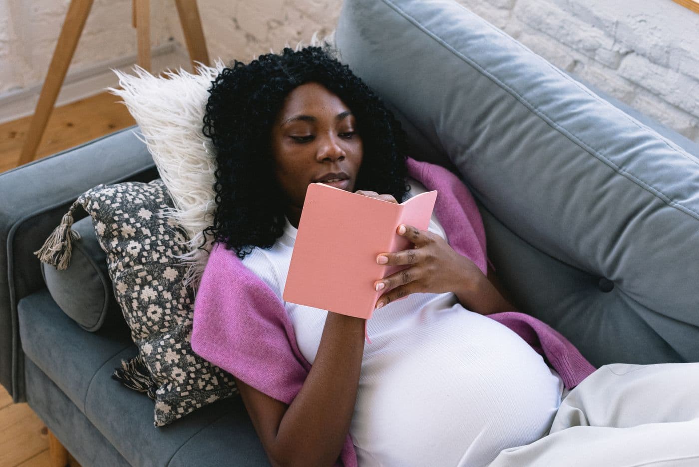 A pregnant woman planning what she needs